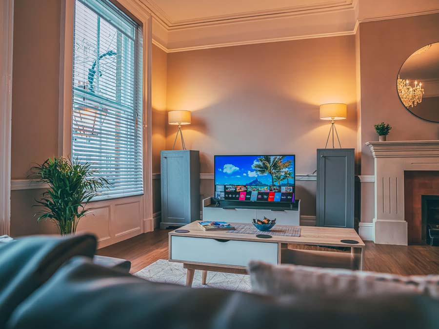 Pastel pink walls and modern furnishings adorn a high quality property renovation by Pattison Property Group in Cheshire